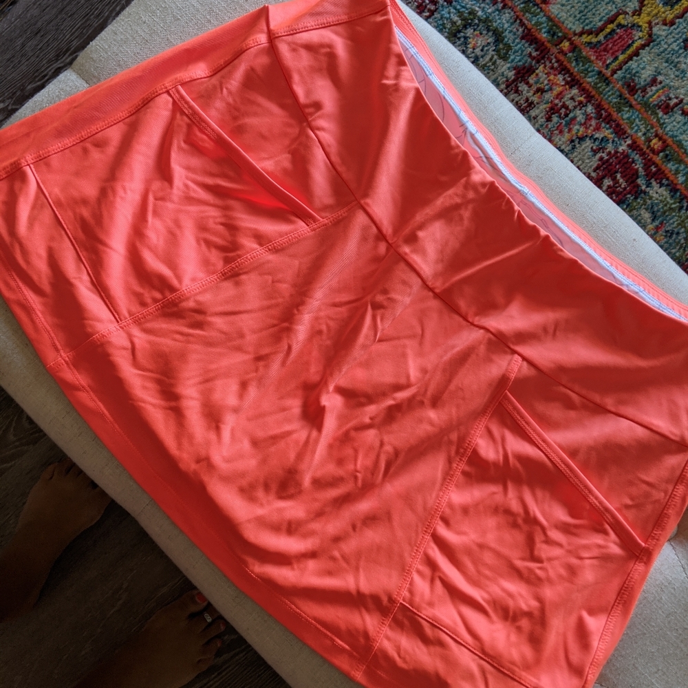 TAIL Neon Orange tennis skirt/skort with 4 pockets